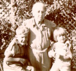 Lillian Grace McAlpin and Brian John Storey, with their maternal Grandmother.